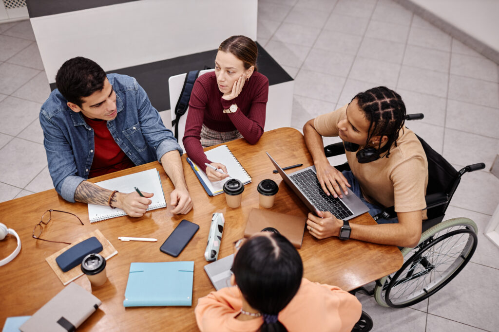 A diverse group of young people working together